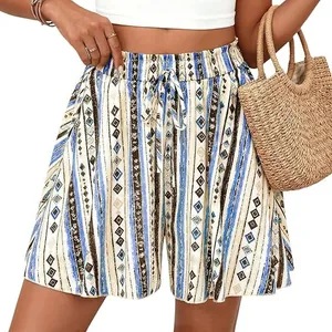 Detailed macro view of women's high-waisted A-line shorts featuring geometric and floral print
