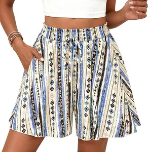 Macro detail of high-waisted A-line shorts featuring vibrant geometric stripe patterns