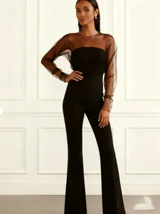Combinaison noire élégante avec manches en tulle transparent et col bustier