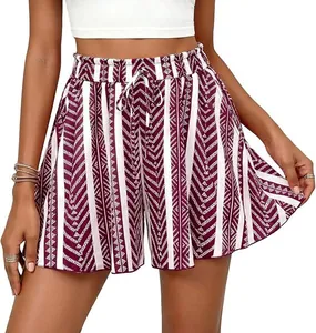 Close-up detail of maroon geometric pattern on high-waisted loose casual A-line shorts