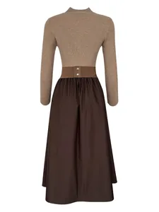Back view detail of a French style long-sleeved dress featuring ribbed knit and brown skirt