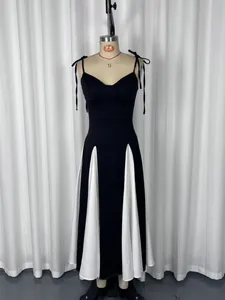 Front view of French style black and white contrast color maxi dress on mannequin