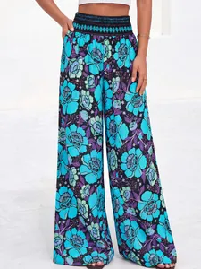 Pantalon large à taille haute pour femme avec un imprimé floral bleu très élégant