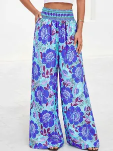 Pantalon bohème à taille haute et jambes larges avec imprimé floral éclatant pour l'été