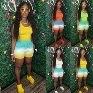 Detail view of diverse color variants for women's gradient short sets and tank tops.