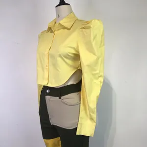 Side view detail of yellow puff sleeve shirt featuring a sexy waist-hollow cut-out design