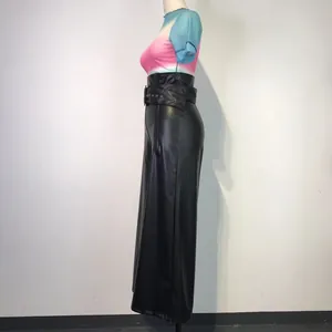 Side view of high-waisted black PU leather wide-leg trousers with metal eyelet belt
