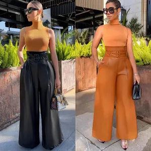 Detailed view of high-waisted PU leather wide-leg fashion pants in black and tan