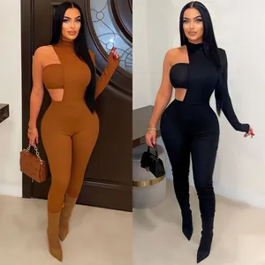 Detailed view of sexy cutout one-shoulder ribbed two-piece fashion set in brown and black.