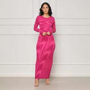 Detail view of a pink irregular wave print bodycon maxi dress with long sleeves.