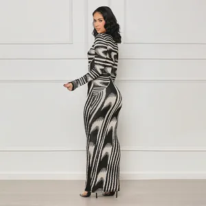 Elegant sexy bodycon maxi dress featuring irregular black and white print and long sleeves