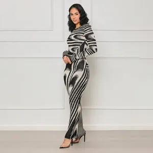 Elegant long sleeve bodycon maxi dress with black and white abstract pattern print details