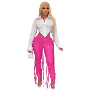 Trendy roze PU-leren bodycon broek met ingewikkelde veterdetails