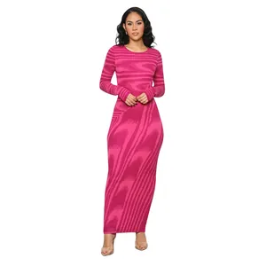 Detailed view of women's long sleeve maxi dress featuring irregular pink print patterns