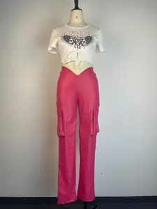 Trendy hot pink low-waist PU leather cargo pants with straight leg and side pockets