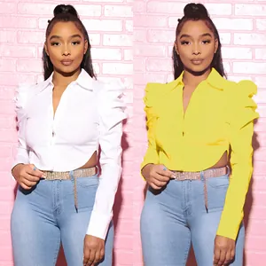 Fashionable waist-baring lapel shirt with puff sleeves and unique slit detail in two colors
