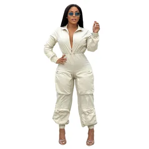 Chic cream long sleeve cinched waist cargo jumpsuit with metallic zipper and large pockets