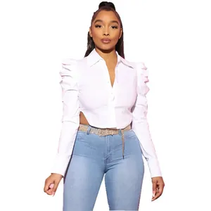 Stylish women's white long-sleeved puff sleeve shirt with lapel collar and sexy waist cutout