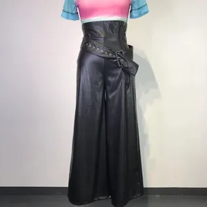 High-waisted black PU leather wide-leg pants with decorative metal eyelet belt detail