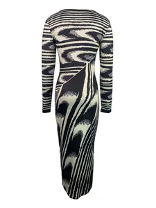 Back view of a sexy slim fit long sleeve maxi dress with irregular wavy print