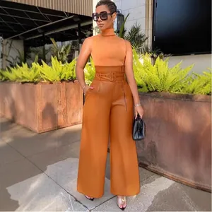 Elegant high-waisted orange PU leather wide-leg pants with matching belt for women