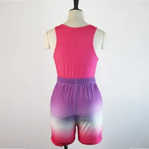 Detailed back view of women's pink racerback tank top and gradient sports shorts