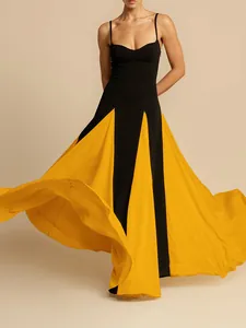Elegant black and yellow stitched camisole evening gown with a flowing large swing skirt