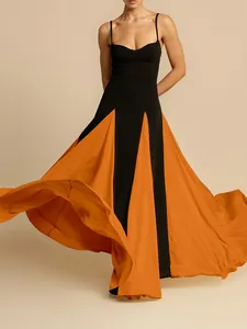 Detail of elegant black and orange color-block flared hem spaghetti strap evening gown