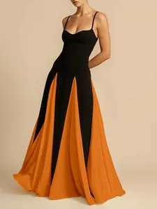 Elegant black and orange spliced maxi evening gown with spaghetti straps and sweetheart neck.