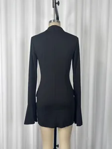Back view of a black slim fit long-sleeved bodycon dress on a mannequin