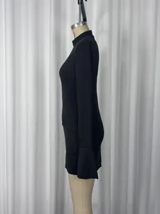 Side view detail of a black slim-fit long-sleeve mini bodycon dress on a mannequin