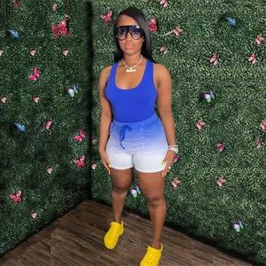 Women's sporty 2-piece set featuring a royal blue racerback tank and gradient shorts