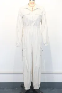 Detail view of a women's white long-sleeved cargo jumpsuit with pockets on a mannequin