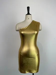 Detailed view of a shiny gold metallic one-shoulder bodycon dress on a mannequin.