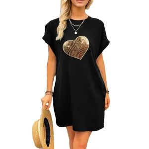 Fashionable casual black t-shirt dress with golden sequin heart for women outing