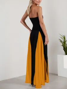 Detailed back view of a sexy black and yellow color-block strapless evening maxi dress