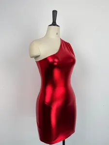 Detail view of red metallic one-shoulder bodycon dress showing glossy fabric texture.