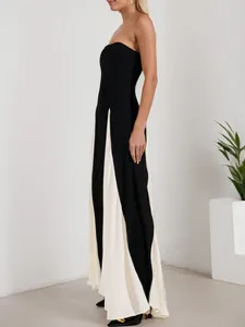 Elegant strapless color-block evening maxi dress in black and white with pleated inserts