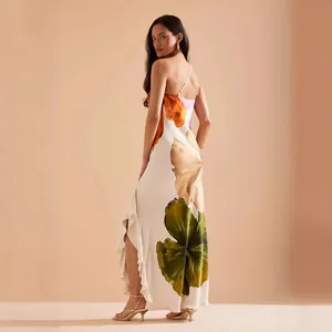 Full length view of elegant floral maxi dress with ruffle hem and backless design