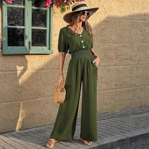 Elegant short-sleeved V-neck wide-leg jumpsuit with smocked waist in olive green finish