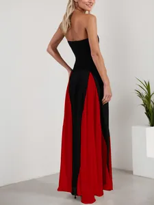 Back view of a sexy color-block strapless maxi dress featuring red pleated chiffon panels