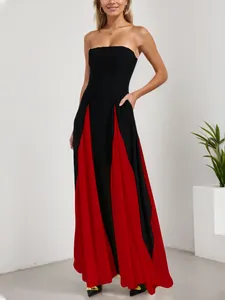 Elegant strapless black and red color block evening gown with pleated skirt detail