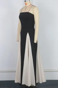 Elegant black and cream colorblock strapless maxi dress evening gown on mannequin