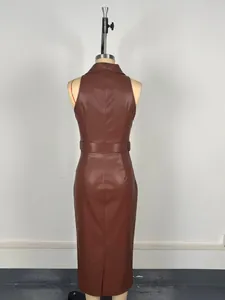 Back view of elegant brown PU leather midi dress on dress form with waist belt detail