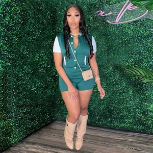 Chic green and white button-down tight waist short romper for women shown on model