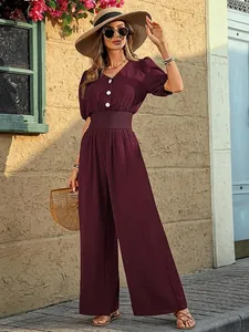 Elegant burgundy short sleeve high-waist wide-leg jumpsuit for a stylish outdoor look