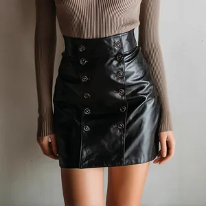 Detailed view of a black double-breasted PU leather mini skirt with bodycon fit