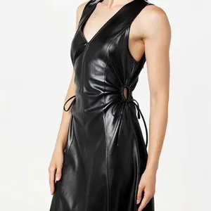 Close-up showing the side drawstring cutout and premium shiny PU leather texture.