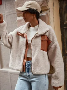 Stylish women's cropped sherpa jacket featuring faux leather patchwork and zipper