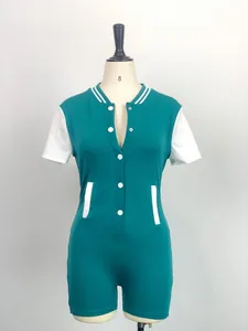 Frontal detail view of a teal and white button-front slim fit bodysuit on a mannequin